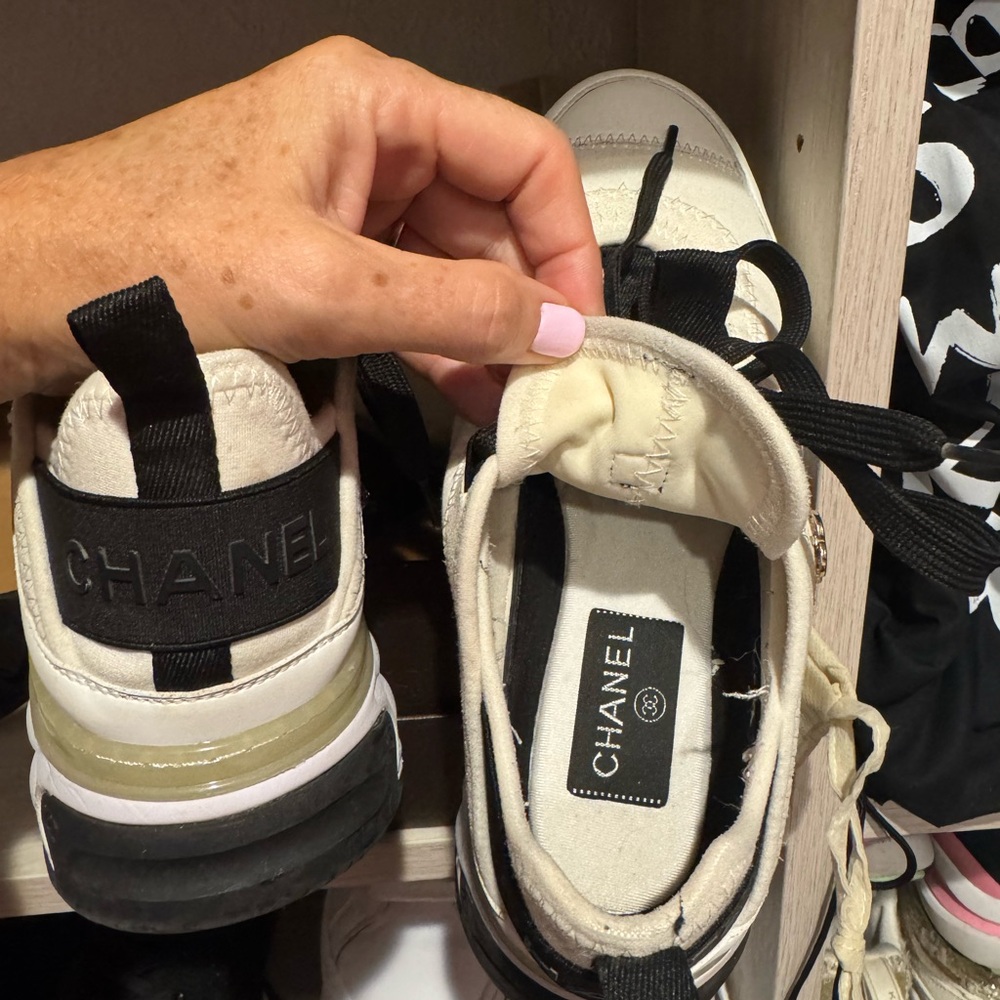 CHANEL White and Black Sneakers with Gold Accent - Picture 6 of 6